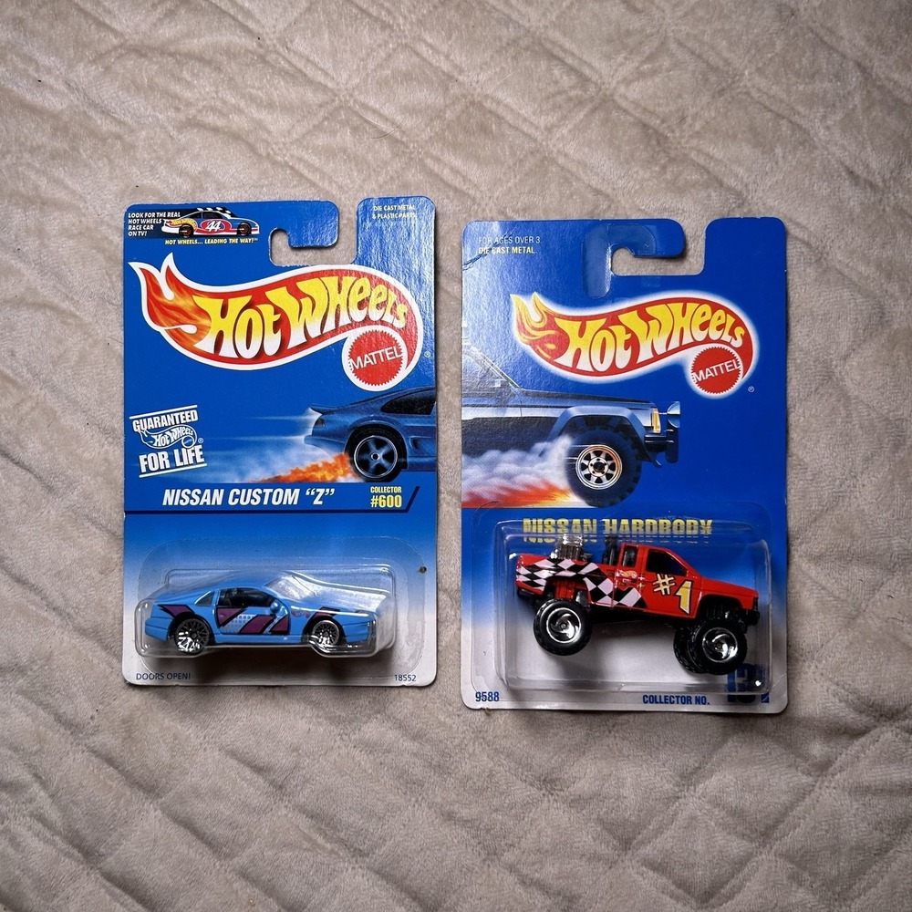 Hot Wheels Set Of 2 Nissan Cars Diecast NIB 1:64 #600 #131